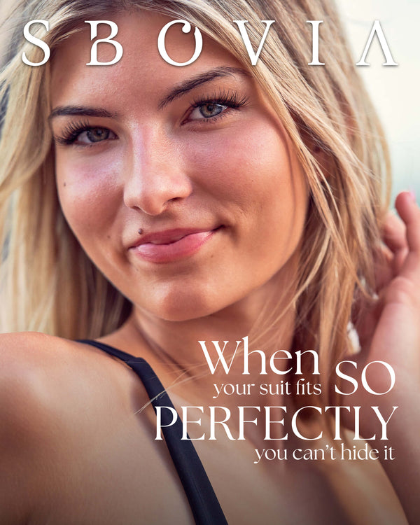 A close-up beauty/editorial photo of a blonde woman with the brand name SBOVIA at the top and the text 'When SO your suit fits PERFECTLY you can't hide it' overlaid on the image.