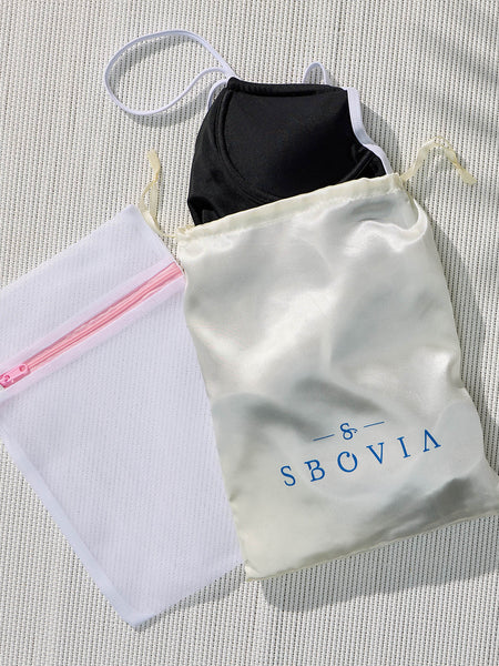 SBOVIA luxury swimwear packaging featuring Midnight Contrast one-piece