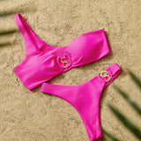 Front angle view of asymmetric crimson red luxury bikini on model