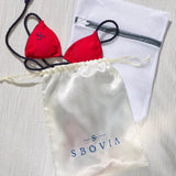 Deep red bikini packaging and presentation