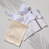 SBOVIA Oro Puro metallic gold monokini packed in SBOVIA branded bag with signature luxury packaging