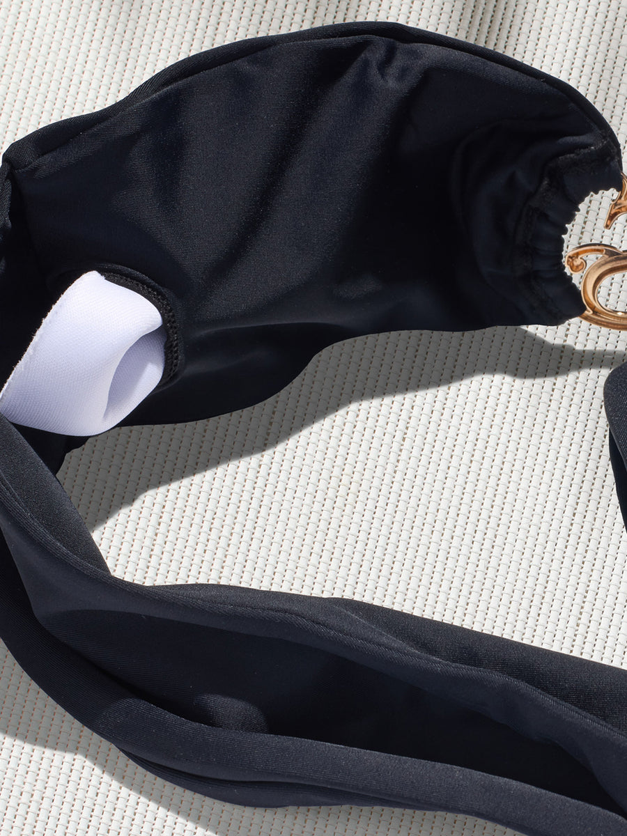 SBOVIA Nero Classico black single-shoulder bikini set product shot with asymmetrical design and premium hardware